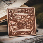 Square birch wood magnet featuring Hans Holbein the Younger's Danse Macabre alphabet letter Z woodcut from 1523.