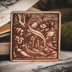 Square birch wood magnet featuring Hans Holbein the Younger's Danse Macabre alphabet letter S woodcut from 1523.
